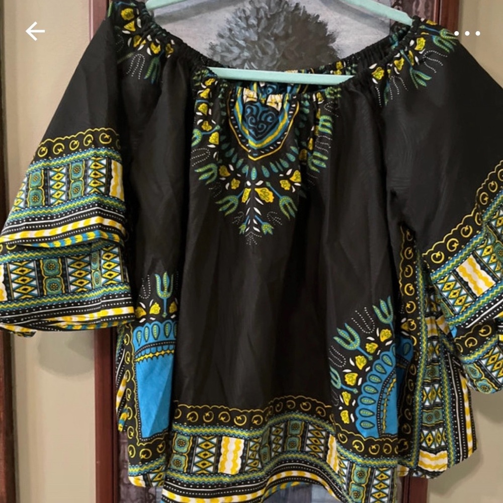 Black Top with Teal & Yellow Print one size fits most. Sleeves with layers.
